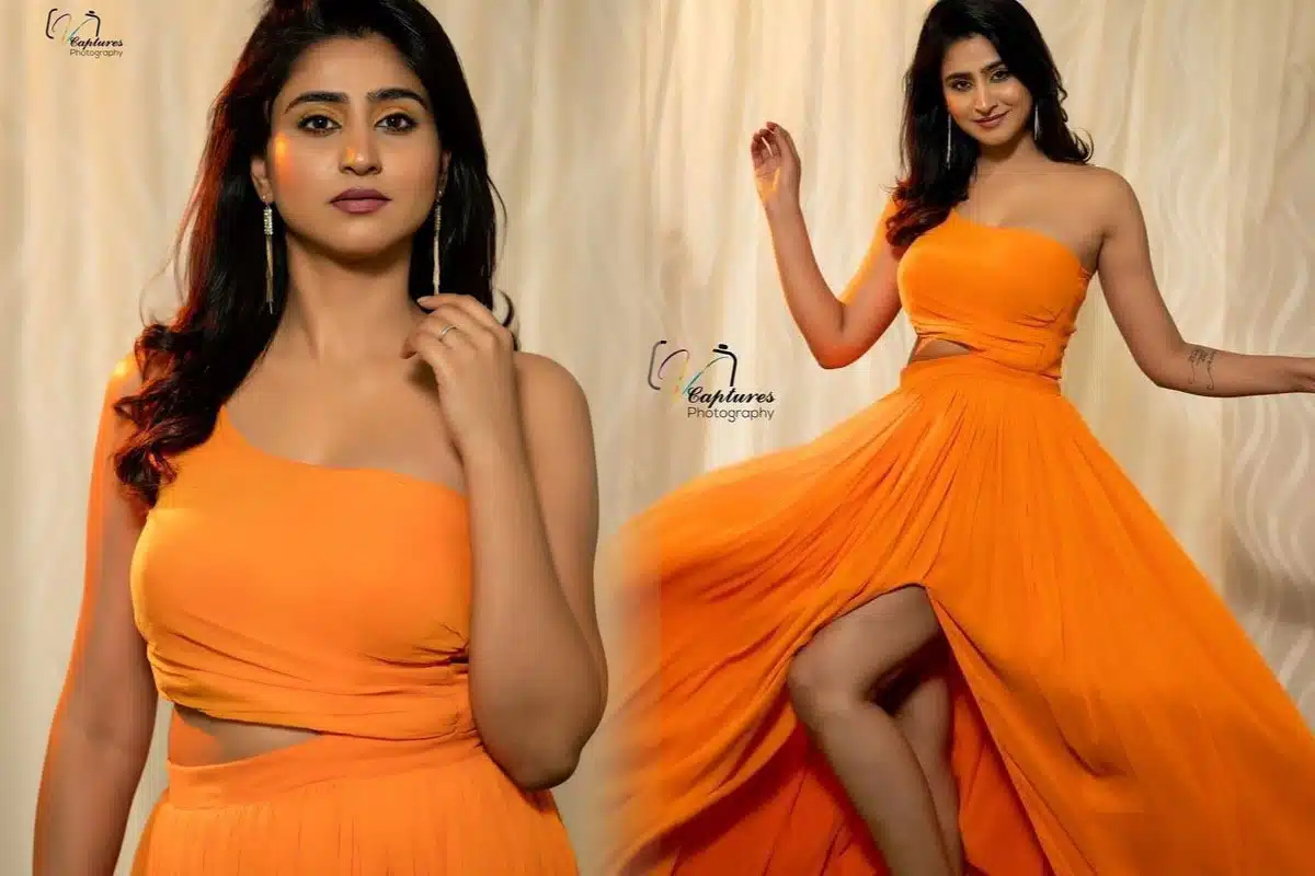 Anchor Varshini Sounderajan beautiful orange dress Photos