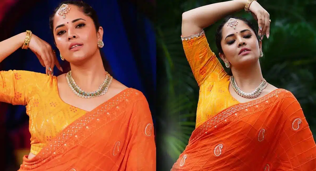 Anasuya Bharadwaj orange saree pics