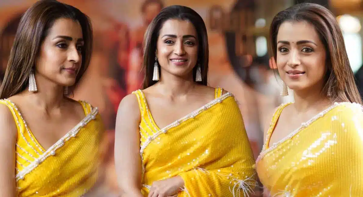 trisha social media post with yellow saree goes viral