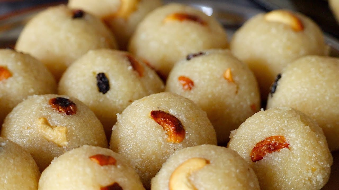 Rava Laddu Recipe : రవ్వ లడ్డు గుడిలో ప్రసాదంలా మెత్తగా కమ్మగా రావాలంటే ఇలా చేయండి…!!