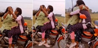Viral Video Two girls excited by ks on a running bike on the road