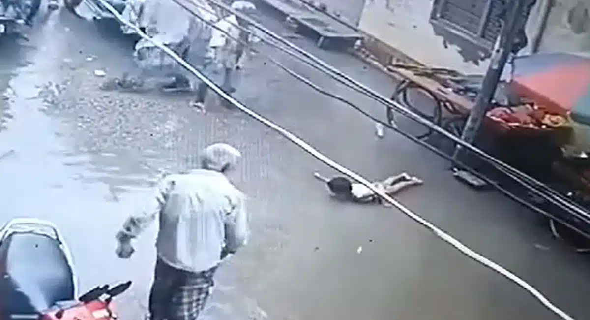 Old man save the child from current shck Viral Video